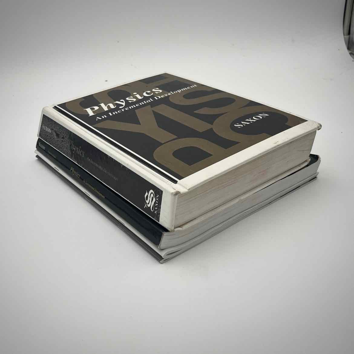 Saxon Physics Student Textbook on a white background.