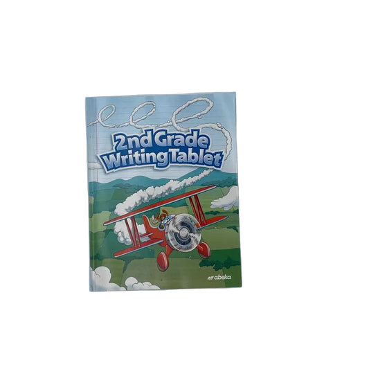 2nd Grade Writing Tablet A Beka 2nd Grade Student Book Language Arts Curriculum on a white background.