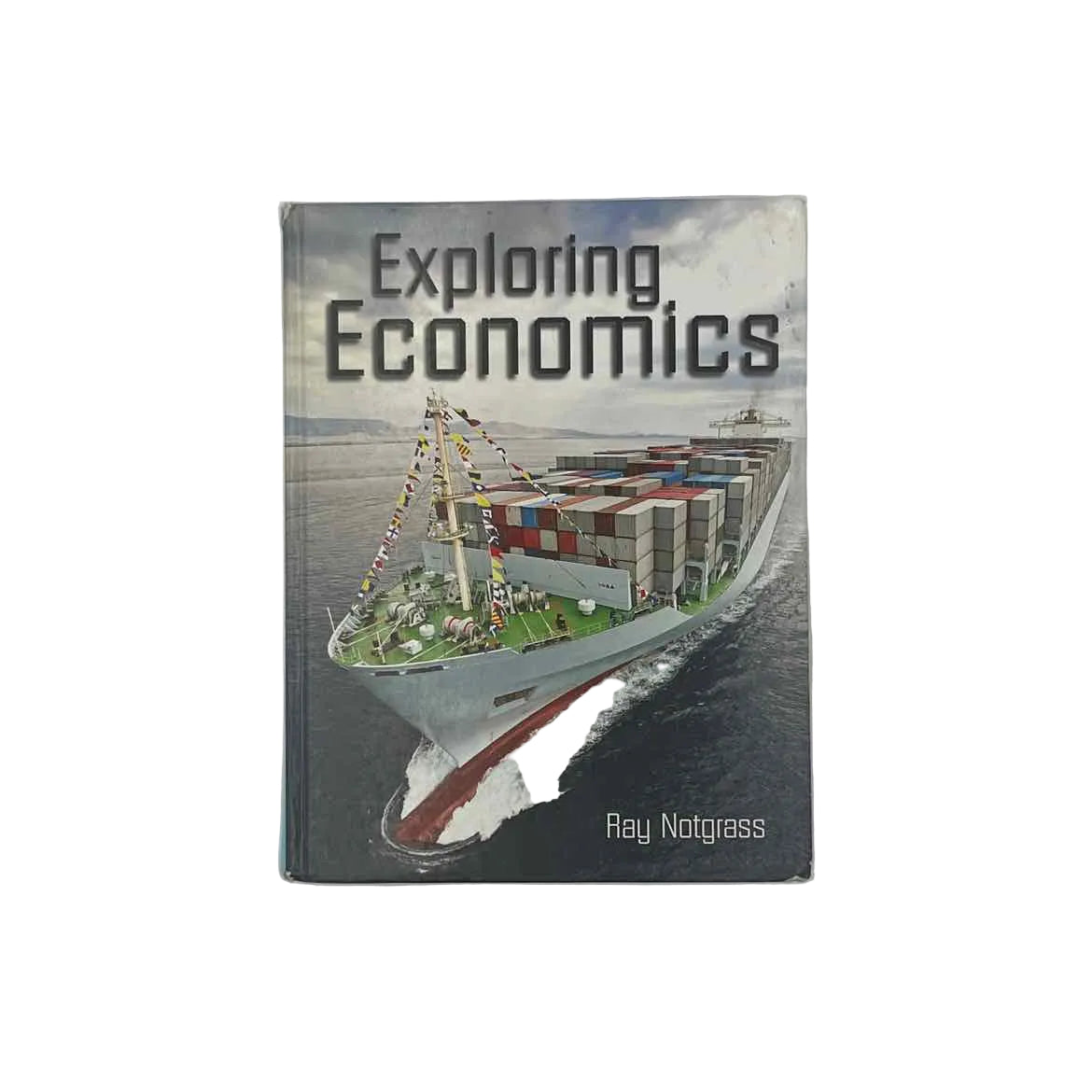 Notgrass Highschool Exploring Economics Textbook on a white background.