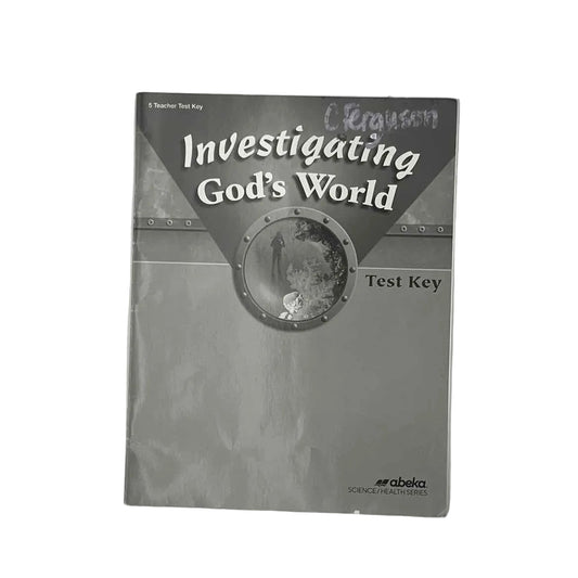 A Beka 5th Grade Investigating God's World Test Key (name on front) on a white background.